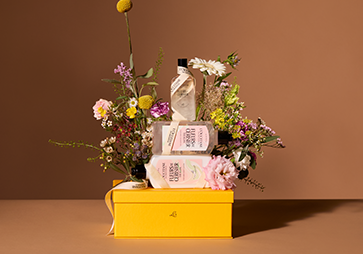L'OCCITANE gift box with L'OCCITANE Immortelle Overnight Reset Serum, L'OCCITANE Verbena Eau de Toilette, L'OCCITANE Almond Shower Oil (Travel Size), L'OCCITANE The Petit Remedy & L'OCCITANE Shea Butter Hand Cream (Travel Size)
