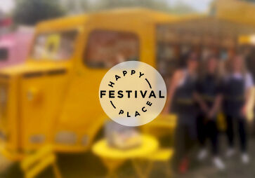 Happy Place Festival Logo on image showing people L'OCCITANE Brand Ambassadors welcoming guests.